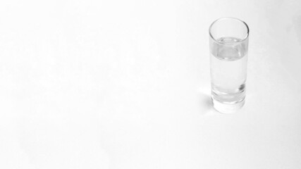 clean water glass cup with white background and copy space.