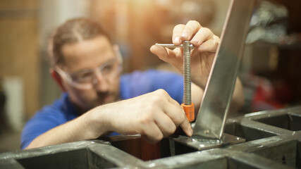 Obraz na płótnie Canvas Craftsman worker working on steel structure in factory
