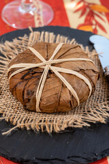 Taste of Provence, ancient small goat cheese Banon a la feuille wrapped in chestnut leaves and tied with raffia.