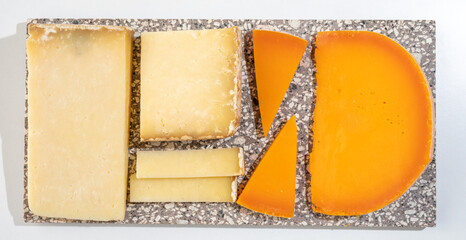 Cheese collection, hard French cheese old cantal and yellow mimolette made from raw cow milk with...