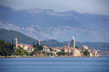 Fototapeta premium the famous church tower of rab view from the adriatic sea