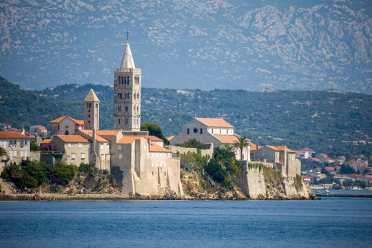 the famous church tower of rab view from the adriatic sea