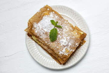 Homemade arabic cake with filo pastry and pastry cream