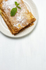 Homemade arabic cake with filo pastry and pastry cream