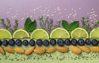 Lime, blueberry and nuts food background