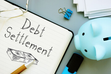Debt Settlement is shown on the business photo using the text - obrazy, fototapety, plakaty