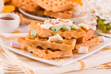 Waffles with colourful marshmallow.