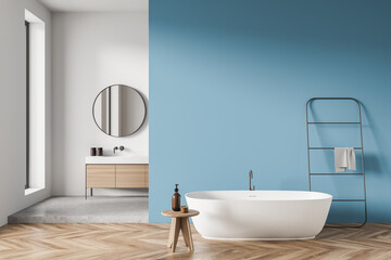 Fototapeta na wymiar White and blue minimalist bathroom with a vanity area on the background