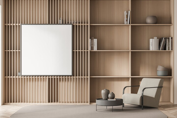 Living room interior with comfortable armchair, white empty poster