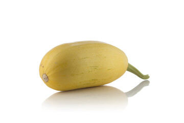 A small yellow zucchini on a white background.