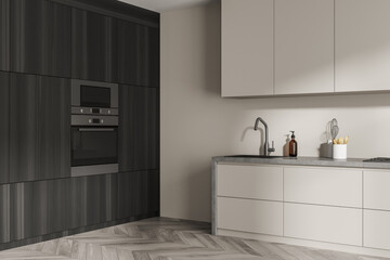 Corner of modern beige kitchen with floor-to-ceiling dark wood area