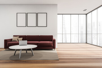 Three mock up posters in the minimalist white and red living room