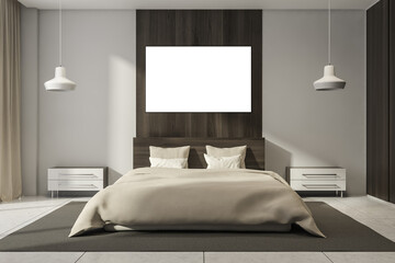 Bright bedroom interior with bed, empty poster and bedsides