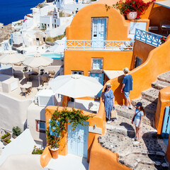 Family in Oia village in Santorini