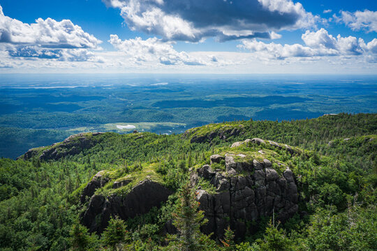 View on Saguenay on a summer day from the top of Pic de la Hutte, a peak located in Monts Valin National Park (Quebec, Canada)