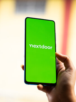 Assam, india - May 18, 2021 : Nextdoor logo on phone screen stock image.