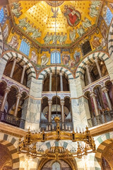 Fototapeta na wymiar AACHEN, GERMANY, 23 JULY 2020 The beutiful golden interior of the Palatine Chapel