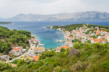 Fototapeta na wymiar Spectacular view on Povlja town located on the north coast of Brac island in Croatia