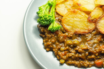 Minced beef hotpot, tender british beef in a warming gravy with carrots and peas, all topped with sliced roast potatoes