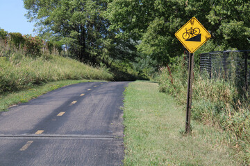 Yellow Sign on Bike Trail