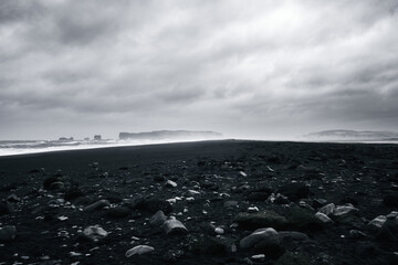 Dark and moody morning storm at Reynisfjara black sand beach near Vik, South Iceland
