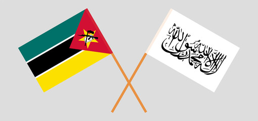 Crossed flags of Mozambique and Islamic Emirate of Afghanistan. Official colors. Correct proportion