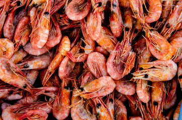 Shrimp in a box on the counter. Background for the counter.