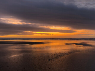 Fototapeta na wymiar A beach in Wales during sunset