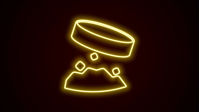 Glowing neon line Giant magnet holding iron dust icon isolated on black background. 4K Video motion graphic animation
