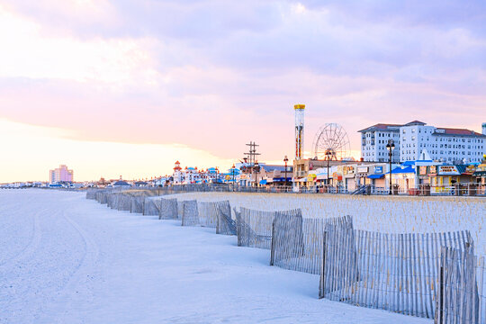 Evening on the beach and boardwalk of Ocean City, New Jersey. 