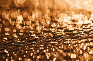 Light reflection with water drops on the wet surface after the rain