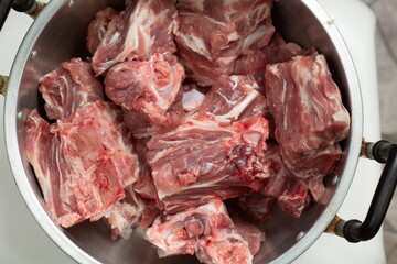 Fresh pork in a pot for cooking,fresh food concept.