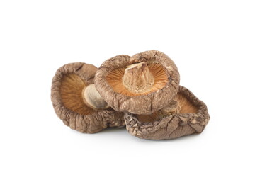 Dried shiitake mushrooms isolated on white.