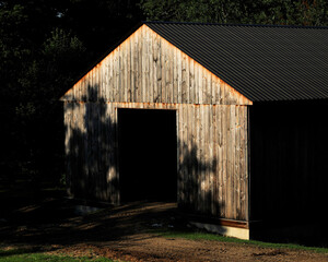old barn in shadows