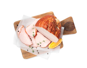 Delicious cut ham with thyme, orange slice and peppercorns isolated on white, top view