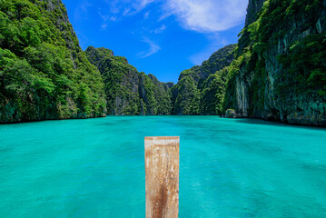 Travel vacation background Pileh bay at Phi Phi island. Blue sky