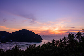 Twilight sunset on Phi Phi Don island view point. Beautiful landscape with tropical sea lagoon.