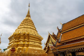 Fototapeta na wymiar Beautiful golden pagoda in wat Phra That Doi Suthep, Chiangmai Thailand