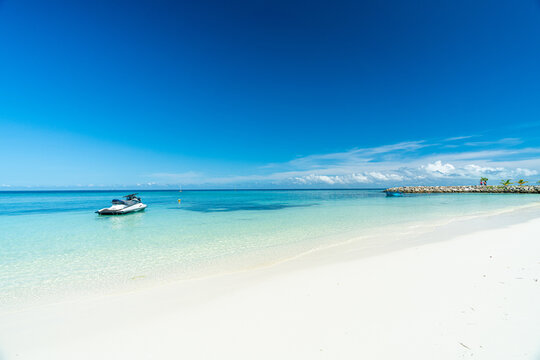 Beautiful white sand beach and blue sky in Maafushi Island, Maldives