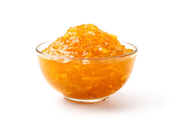 Orange marmalade in glass bowl isolated on white background.