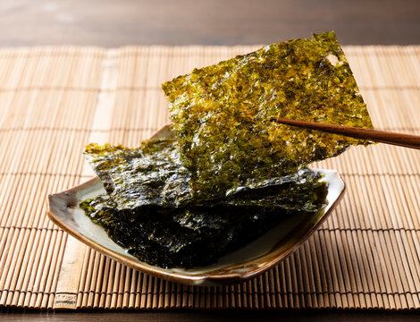 Korean seaweed on a wooden table. Asian food.