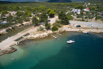 Beautiful Beach and Adriatic Sea with Transparent Blue Water near Split, Croatia - obrazy, fototapety, plakaty