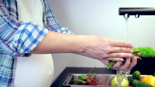Healthy Nutrition Of Pregnant Woman Cooking Salad With Fresh Vegetables.