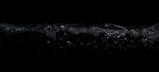Wave of water on a black background