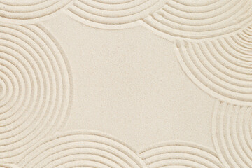 Lines drawing on sand, beautiful sandy texture. Spa background, concept for meditation and...