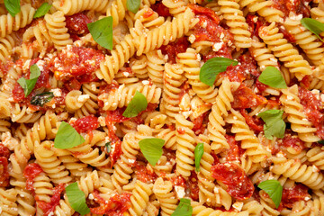 Homemade Baked Feta Tomato Pasta, top view. Flat lay, overhead, from above.