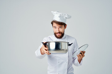 male chef with white hat on his head restaurant kitchen service