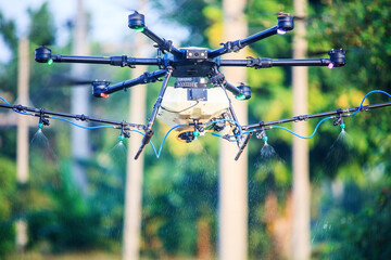 drones for agriculture and forestry spray chemicals on the fields