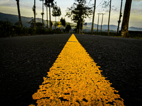 Perspective Yellow Road Line In Mountain