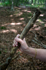 Woman holding a stick